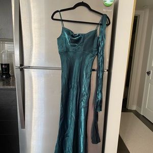 Green floor length ball gown with sash